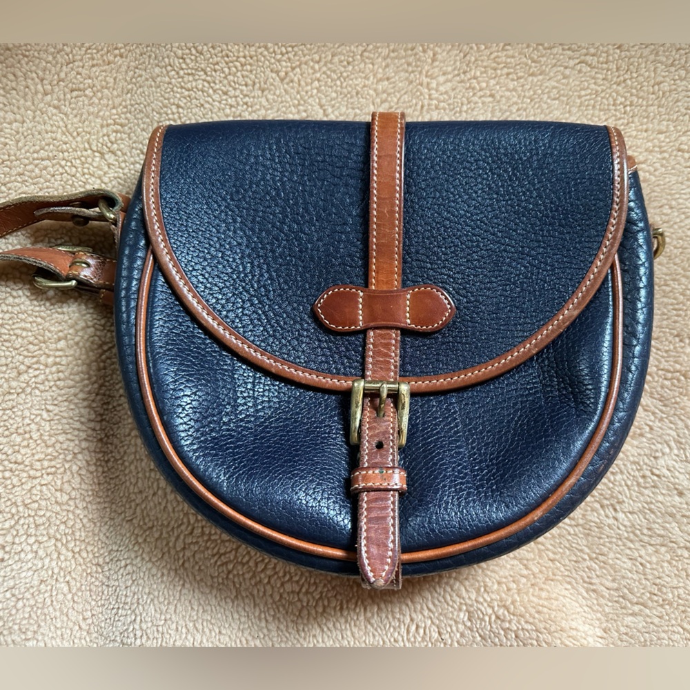 Dooney & Bourke Vintage Classic Navy and Tan Pebble Leather Crossbody Saddle bag